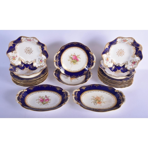 312 - AN ANTIQUE COALPORT PART DESSERT SERVICE decorated with foliage and seaweed scrolls. Largest 28 cm w... 