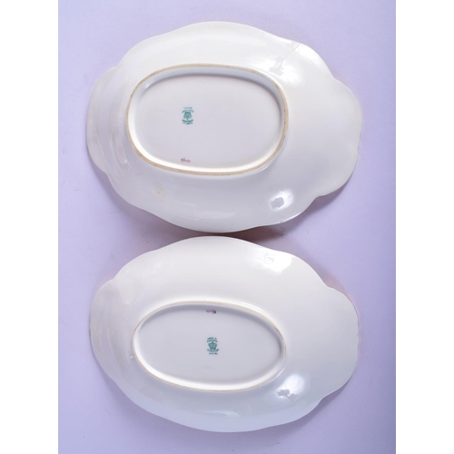 312 - AN ANTIQUE COALPORT PART DESSERT SERVICE decorated with foliage and seaweed scrolls. Largest 28 cm w... 