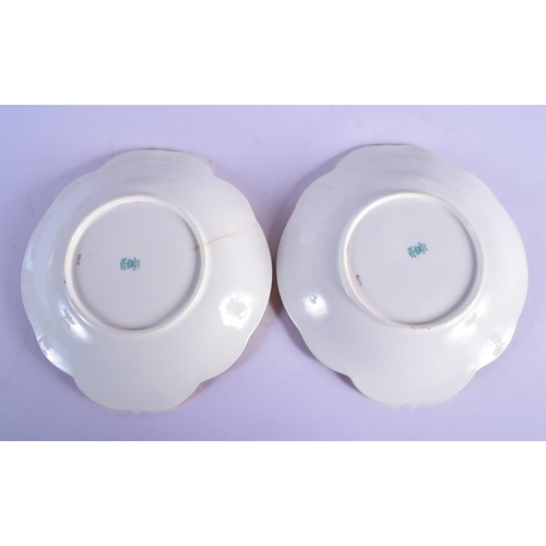 312 - AN ANTIQUE COALPORT PART DESSERT SERVICE decorated with foliage and seaweed scrolls. Largest 28 cm w... 