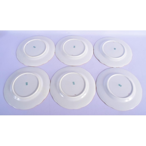 312 - AN ANTIQUE COALPORT PART DESSERT SERVICE decorated with foliage and seaweed scrolls. Largest 28 cm w... 