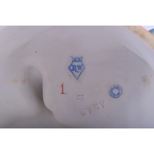 313 - A PAIR OF ANTIQUE BISQUE PORCELAIN FIGURES modelled upon naturalistic bases. 45 cm high.