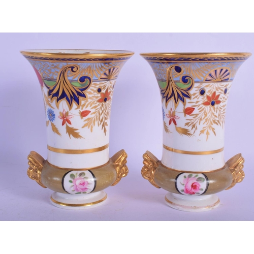 316 - A PAIR OF EARLY 19TH CENTURY SPODE IMARI VASES painted with flowers. 12 cm high.