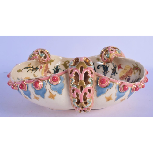 317 - A 19TH CENTURY HUNGARIAN ZSOLNAY PECS TREFOIL FORM BOWL with reticulated handles. 24 cm wide.