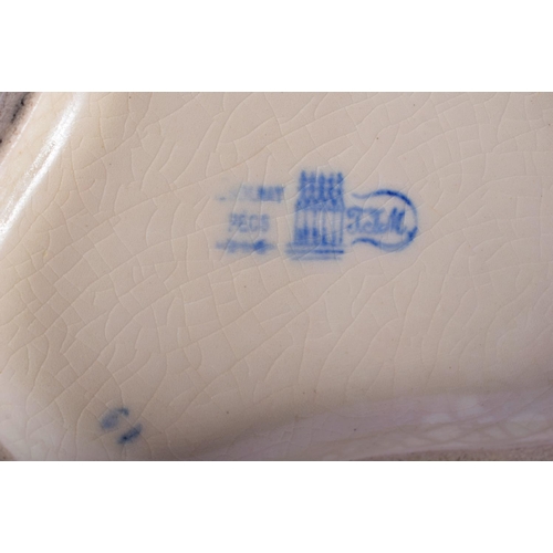 317 - A 19TH CENTURY HUNGARIAN ZSOLNAY PECS TREFOIL FORM BOWL with reticulated handles. 24 cm wide.