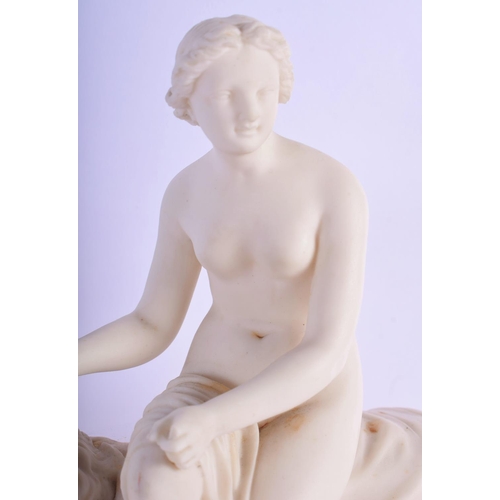 318 - AN UNUSUAL ANTIQUE PARIAN WARE PORCELAIN FIGURE modelled as a female upon a lion. 24 cm x 18 cm.