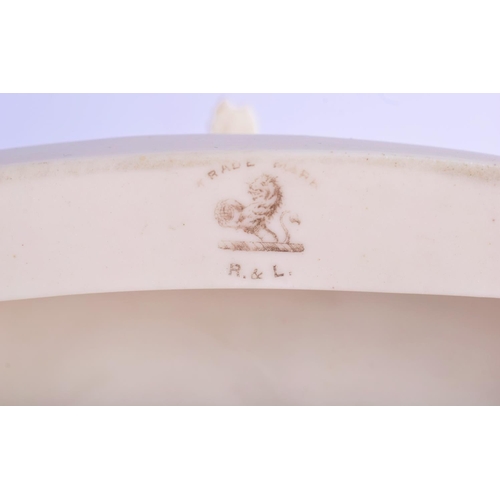 318 - AN UNUSUAL ANTIQUE PARIAN WARE PORCELAIN FIGURE modelled as a female upon a lion. 24 cm x 18 cm.