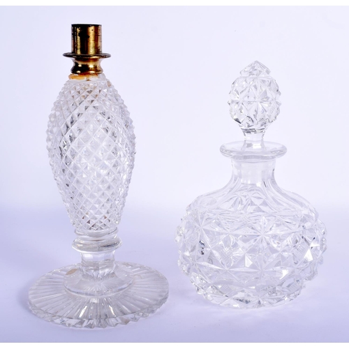 32 - A GEORGE III CRYSTAL GLASS STICK together with an antique cut glass scent bottle. Largest 16 cm high... 