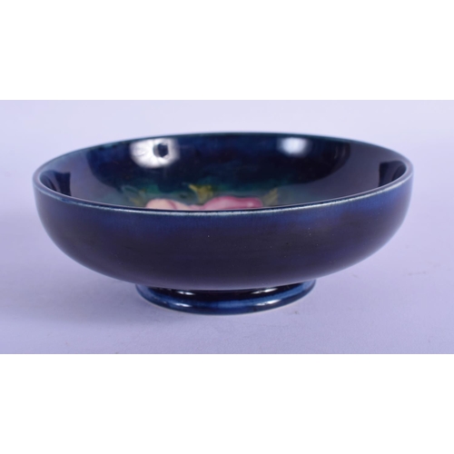 324 - A MOORCROFT DISH. 11 cm diameter.