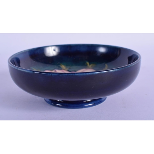 324 - A MOORCROFT DISH. 11 cm diameter.