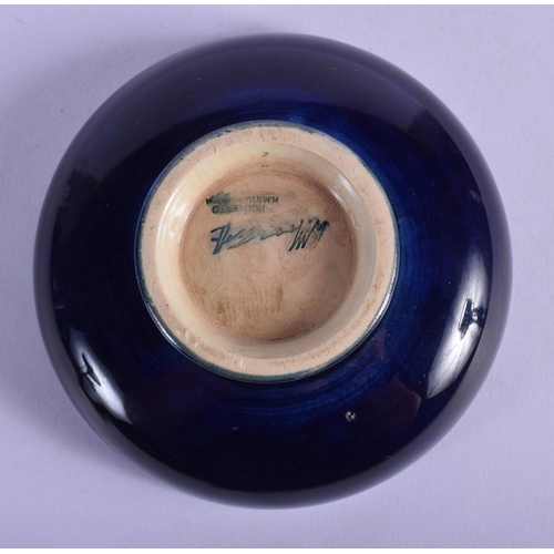 324 - A MOORCROFT DISH. 11 cm diameter.