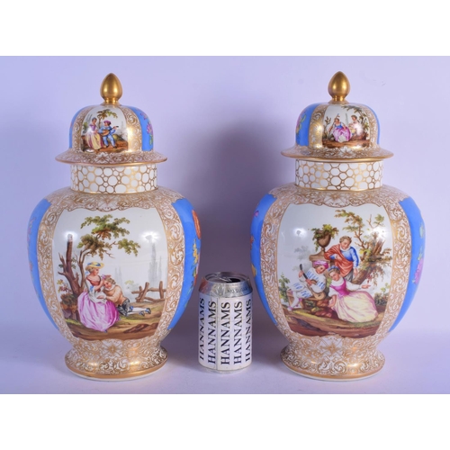 328 - A LARGE PAIR OF 19TH CENTURY GERMAN AUGUSTUS REX VASES AND COVERS painted with lovers. 37 cm x 18 cm... 