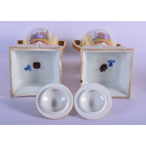 33 - A LARGE PAIR  OF ANTIQUE GERMAN AUGUSTUS REX TWIN HANDLED PORCELAIN VASE AND COVER painted with figu... 