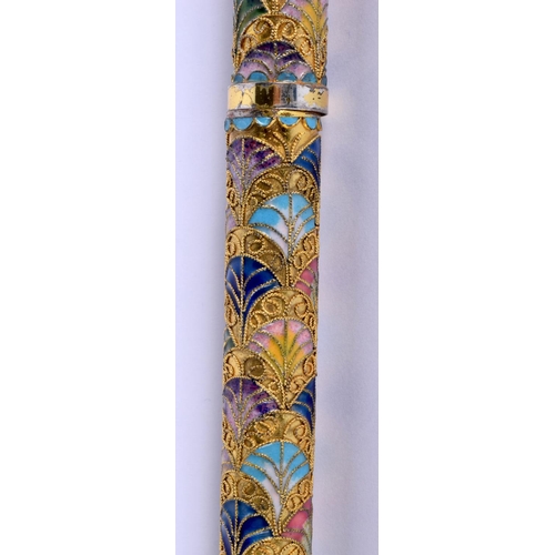 338 - A VINTAGE CONTINENTAL BRASS AND ENAMEL WALKING CANE. 90 cm long.
