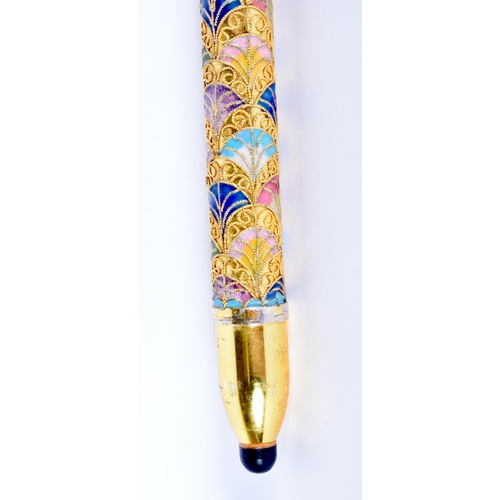 338 - A VINTAGE CONTINENTAL BRASS AND ENAMEL WALKING CANE. 90 cm long.