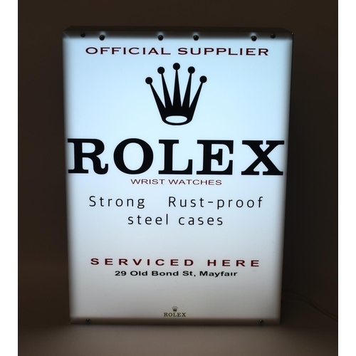 339 - A RARE VINTAGE ROLEX OYSTER WRIST WATCH SERVICING BOX LIGHT SHOP DISPLAY within a metal casing. 54 c... 