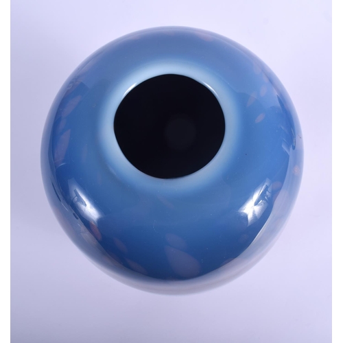 34 - A SCOTTISH MONART BLUE GLASS VASE with splash decoration. 24 xm x 10 cm.