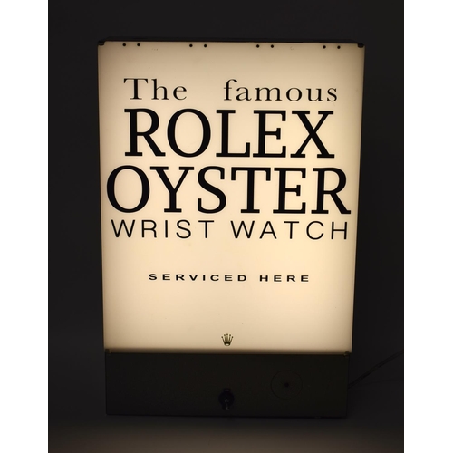 340 - A RARE VINTAGE ROLEX OYSTER WRIST WATCH SERVICING BOX LIGHT SHOP DISPLAY within a metal casing. 54 c... 