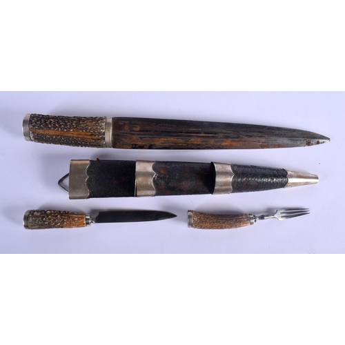 342 - A VINTAGE SCOTTISH HORN HANDLED DIRK DAGGER with white metal mounts. 37 cm long.