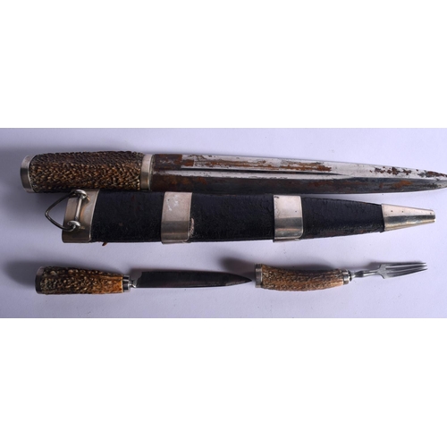 342 - A VINTAGE SCOTTISH HORN HANDLED DIRK DAGGER with white metal mounts. 37 cm long.