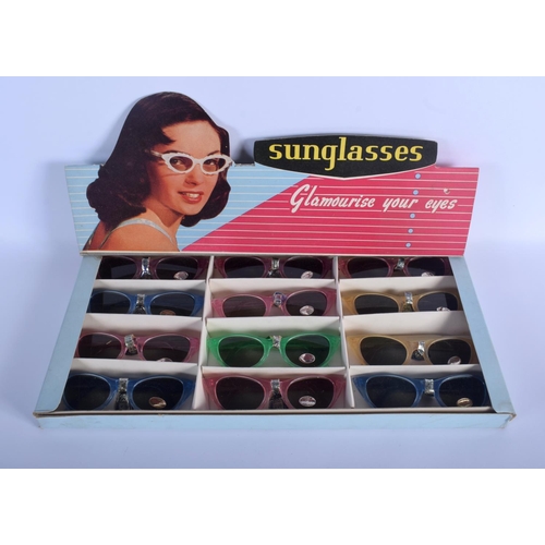 343 - A VINTAGE SUNGLASSES GLAMOURISE YOUR EYES SHOP DISPLAY. 45 cm x 20 cm.