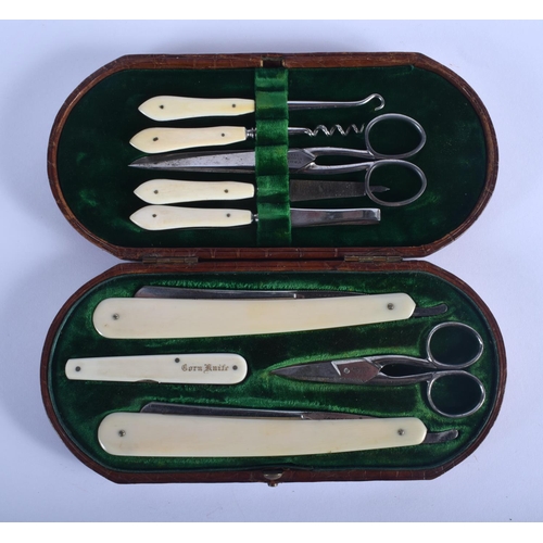 345 - A COLLECTION OF ANTIQUE IVORY GROOMING KIT. 20 cm x 10 cm.