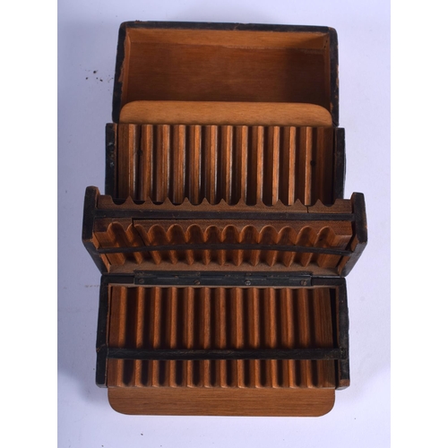 357 - A VERY UNUSUAL 1920S EUROPEAN LEATHER FOLDING CIGARETTE CASE decorated with putti. 14 cm x 8 cm.