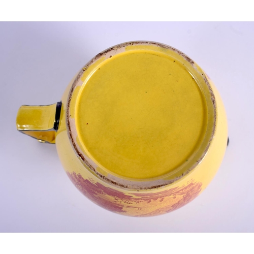 36 - A RARE EARLY 19TH CENTURY CANARY YELLOW POTTERY JUG printed with red landscapes. 13 cm x 13 cm.
