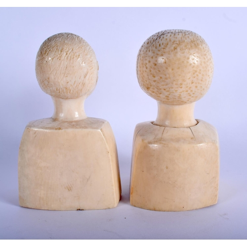 362 - A RARE PAIR OF EARLY 20TH CENTURY AFRICAN TRIBAL COLONIAL CARVED IVORY BUSTS. 12 cm x 5 cm.