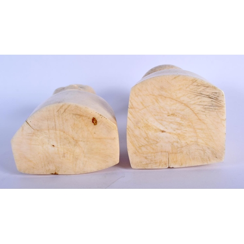 362 - A RARE PAIR OF EARLY 20TH CENTURY AFRICAN TRIBAL COLONIAL CARVED IVORY BUSTS. 12 cm x 5 cm.
