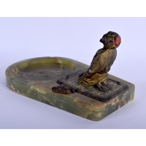 364 - AN ANTIQUE COLD PAINTED BRONZE AND IVORY ONYX ASHTRAY modelled as a kneeling male. 18 cm x 8 cm.