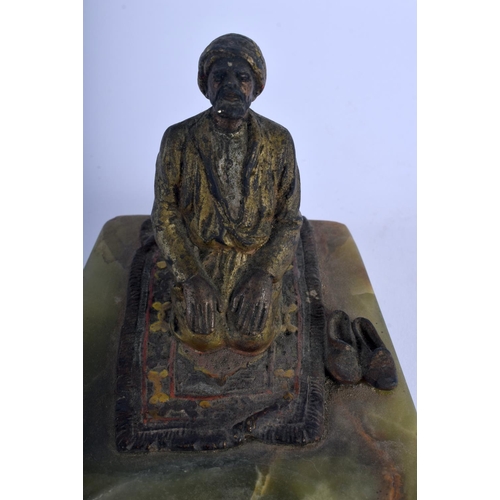 364 - AN ANTIQUE COLD PAINTED BRONZE AND IVORY ONYX ASHTRAY modelled as a kneeling male. 18 cm x 8 cm.