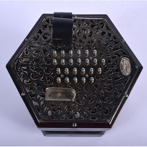 377 - A BOXED 48 BUTTON LACHENAL & CO CONCERTINA within a case. Each end 16 cm x 16 cm.