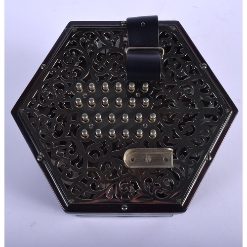 377 - A BOXED 48 BUTTON LACHENAL & CO CONCERTINA within a case. Each end 16 cm x 16 cm.