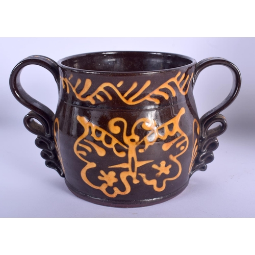 38 - AN 18TH CENTURY DELFT BLUE AND WHITE TIN GLAZED POTTERY PLATE together with an unusual treacle glaze... 