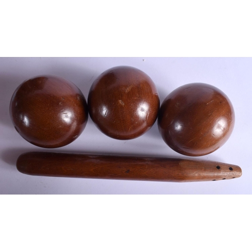 383 - A VERY UNUSUAL LATE VICTORIAN CARVED HARDWOOD SKITTLE SET within original fitted box. 33 cm x 29 cm.