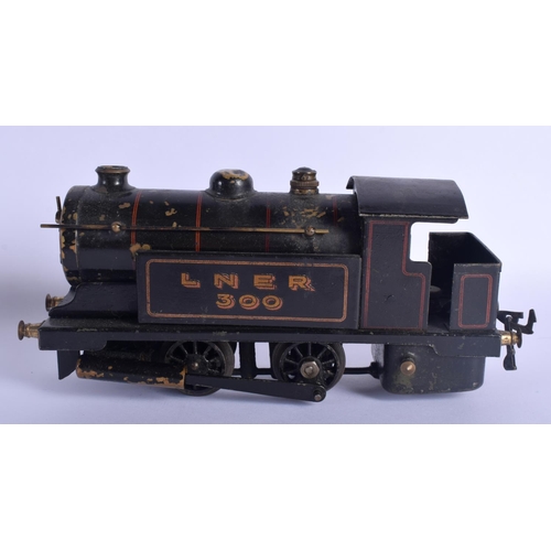 391 - AN ANTIQUE CARVED DOMINO SET together with a bowman tinplate train. Largest 24 cm long. (2)
