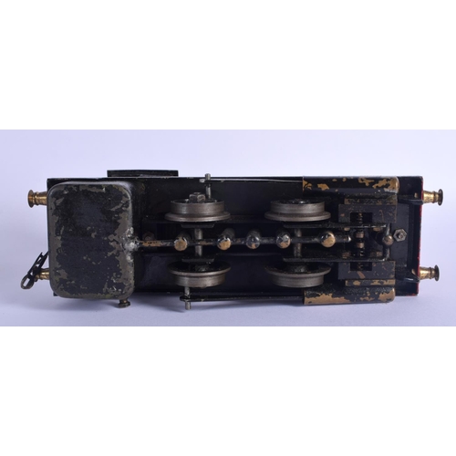 391 - AN ANTIQUE CARVED DOMINO SET together with a bowman tinplate train. Largest 24 cm long. (2)