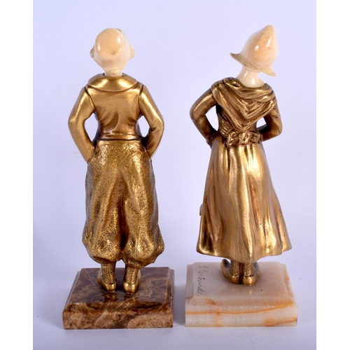 392 - French School (C1920) Bronze and Ivory, Pair of Figures. 17 cm high.