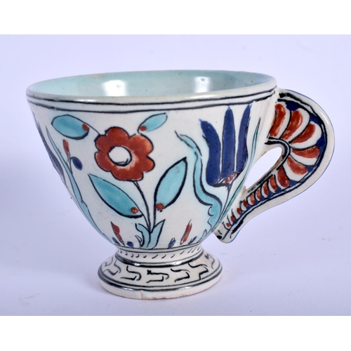 394 - A 19TH CENTURY CANTAGALLI PORCELAIN FAIENCE IZNIK TYPE CUP painted with flowers. 9 cm wide.