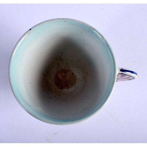 394 - A 19TH CENTURY CANTAGALLI PORCELAIN FAIENCE IZNIK TYPE CUP painted with flowers. 9 cm wide.