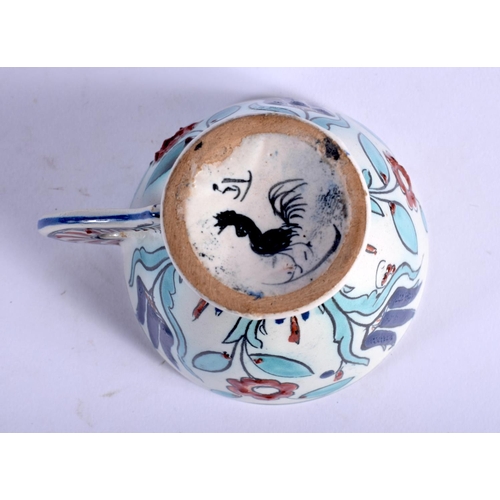 394 - A 19TH CENTURY CANTAGALLI PORCELAIN FAIENCE IZNIK TYPE CUP painted with flowers. 9 cm wide.
