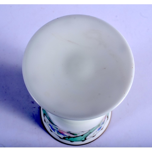 396 - A VINTAGE BOHEMIAN GLASS GOBLET painted with flowers. 18 cm high.