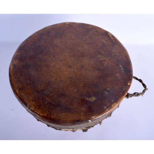 400 - AN EARLY 20TH CENTURY AFRICAN HIDE COVERED ANIMAL SKIN DRUM of naturalstic form. 27 cm x 21 cm.