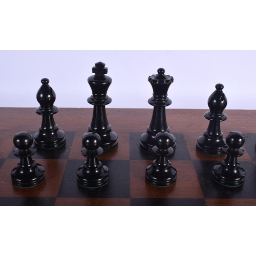 412 - A VINTAGE STAUNTON PATTERN E P CHESS SET No 5 Size, together with an associated chess board. Largest... 