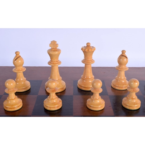 412 - A VINTAGE STAUNTON PATTERN E P CHESS SET No 5 Size, together with an associated chess board. Largest... 