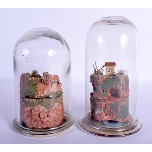 413 - A RARE PAIR OF 19TH CENTURY ROLLED PAPER DIARAMA LANDSCAPES contained within glass domes. Largest 18... 