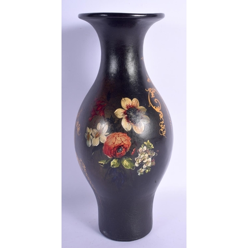 414 - A LARGE EARLY VICTORIAN BLACK LACQUER VASE painted with a bird amongst foliage. 27 cm high.
