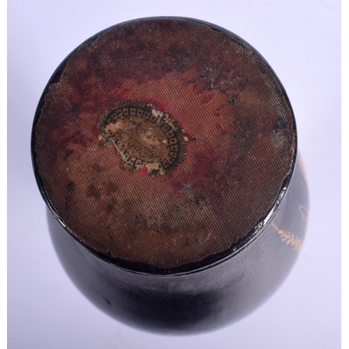 414 - A LARGE EARLY VICTORIAN BLACK LACQUER VASE painted with a bird amongst foliage. 27 cm high.