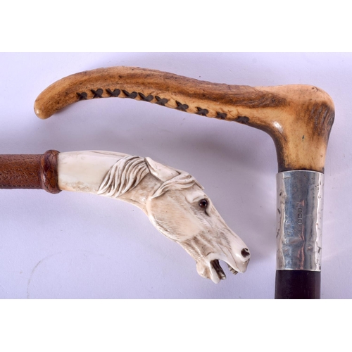 416 - A 19TH CENTURY EUROPEAN IVORY HANDLED HORSE HEAD RIDING CROP together with a 1940s silver mounted cr... 