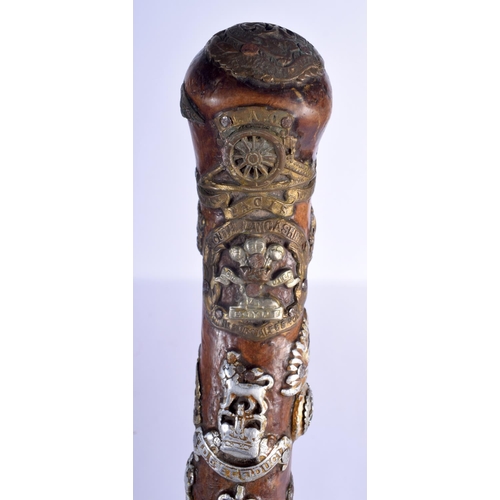 417 - AN UNUSUAL VINTAGE MILITARY FOLK ART TYPE EAGLE HEAD WALKING CANE of almost cermonial axe head form.... 